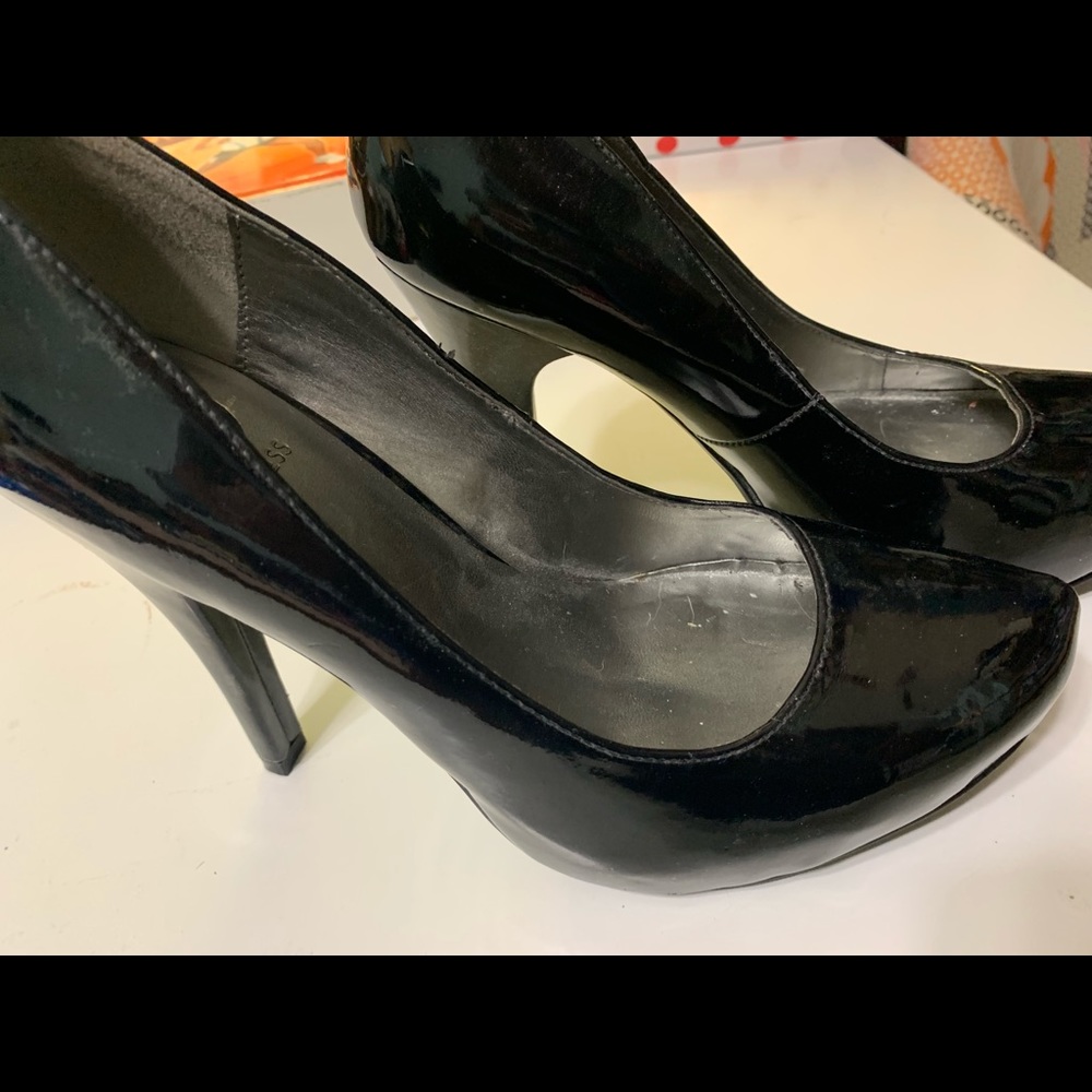 Black Patent leather platform heels by Guess